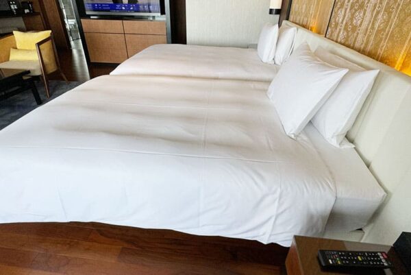 琉球ホテル＆リゾート 名城ビーチ スイートルーム パノラマコーナースイート ベッド ツインベッド